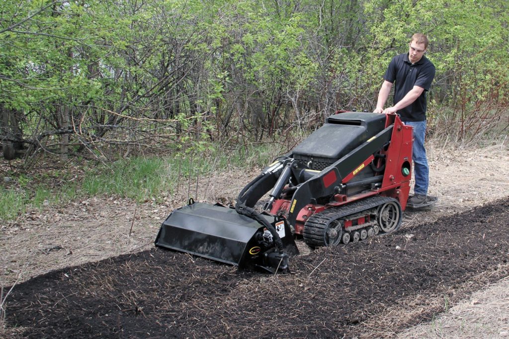 Tiller Attachment for Mini Skid Steer Equipment Rentals in Plymouth